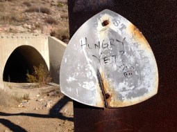 Faded PCT trail marker at the entrance to the tunnel under Hwy 14