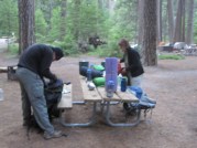 Final adjustments before leaving backpacker's campground