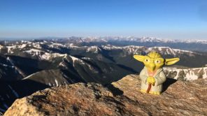 Trail mascot Yoda at the summit of Grays Peak
